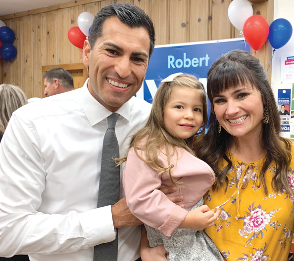 Robert Rivas, his wife, and his daughter